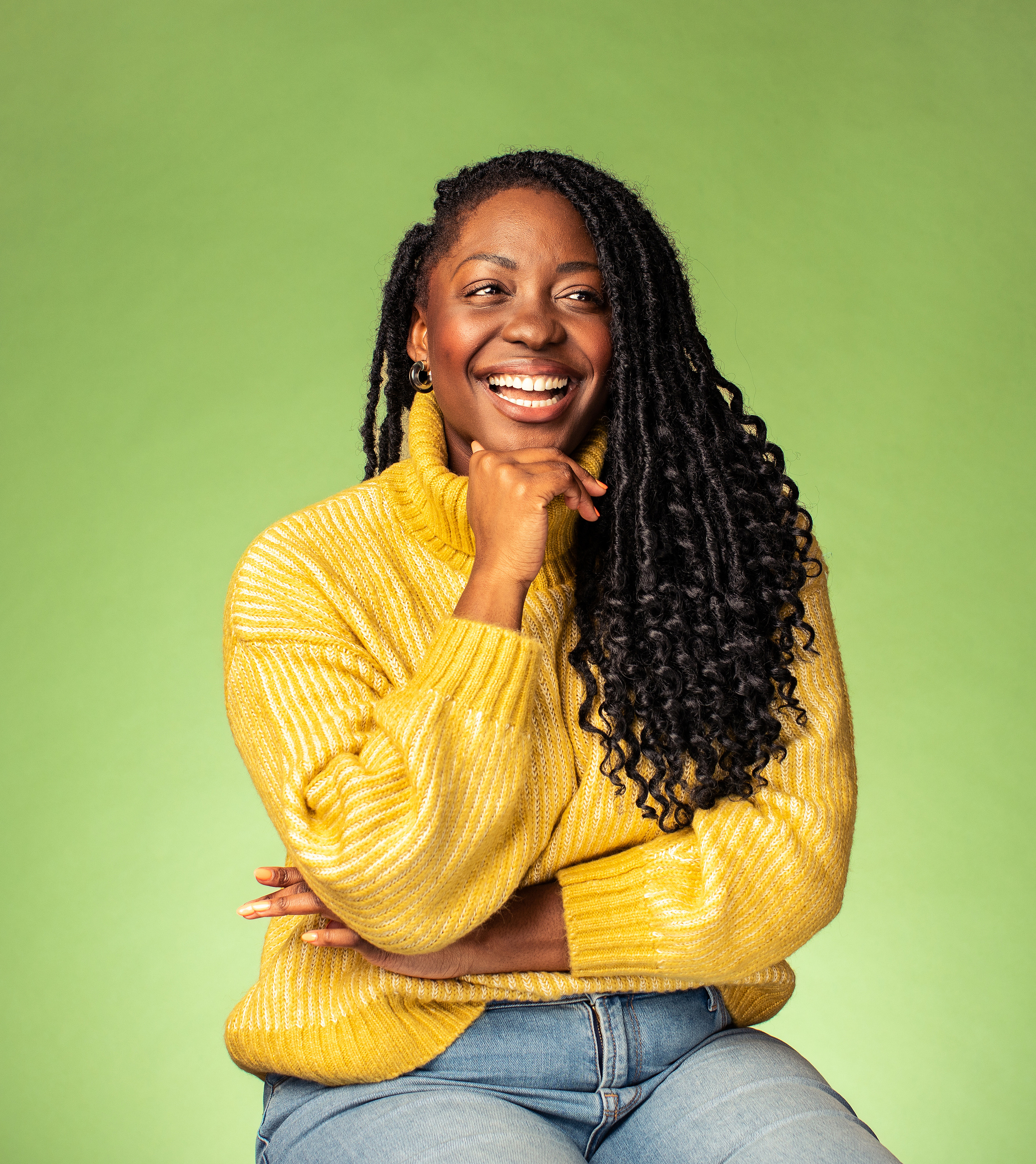 Colorful studio portrait on green backdrop